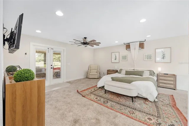 a view of a house with swimming pool and a yard