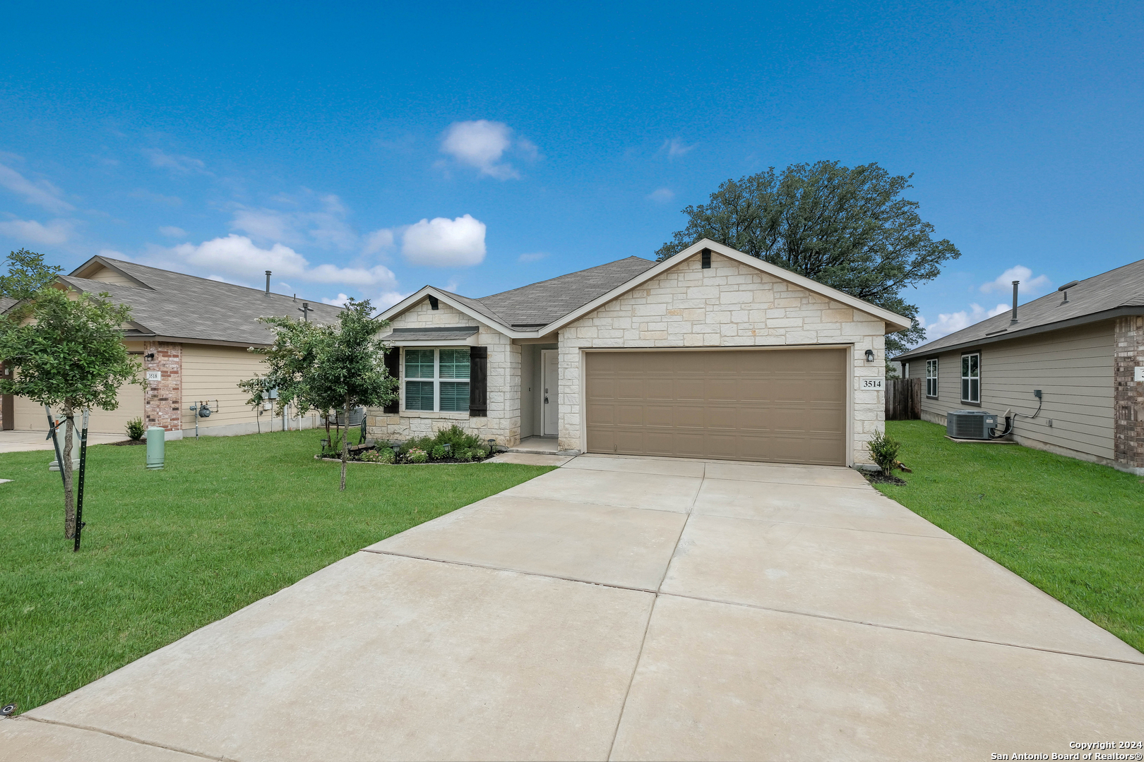 3514 Copper River Bulverde, TX 78163 - Photo 1 of 1 a front view of a house with a yard and garage
