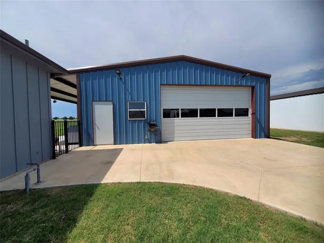 a view of room with wooden floor