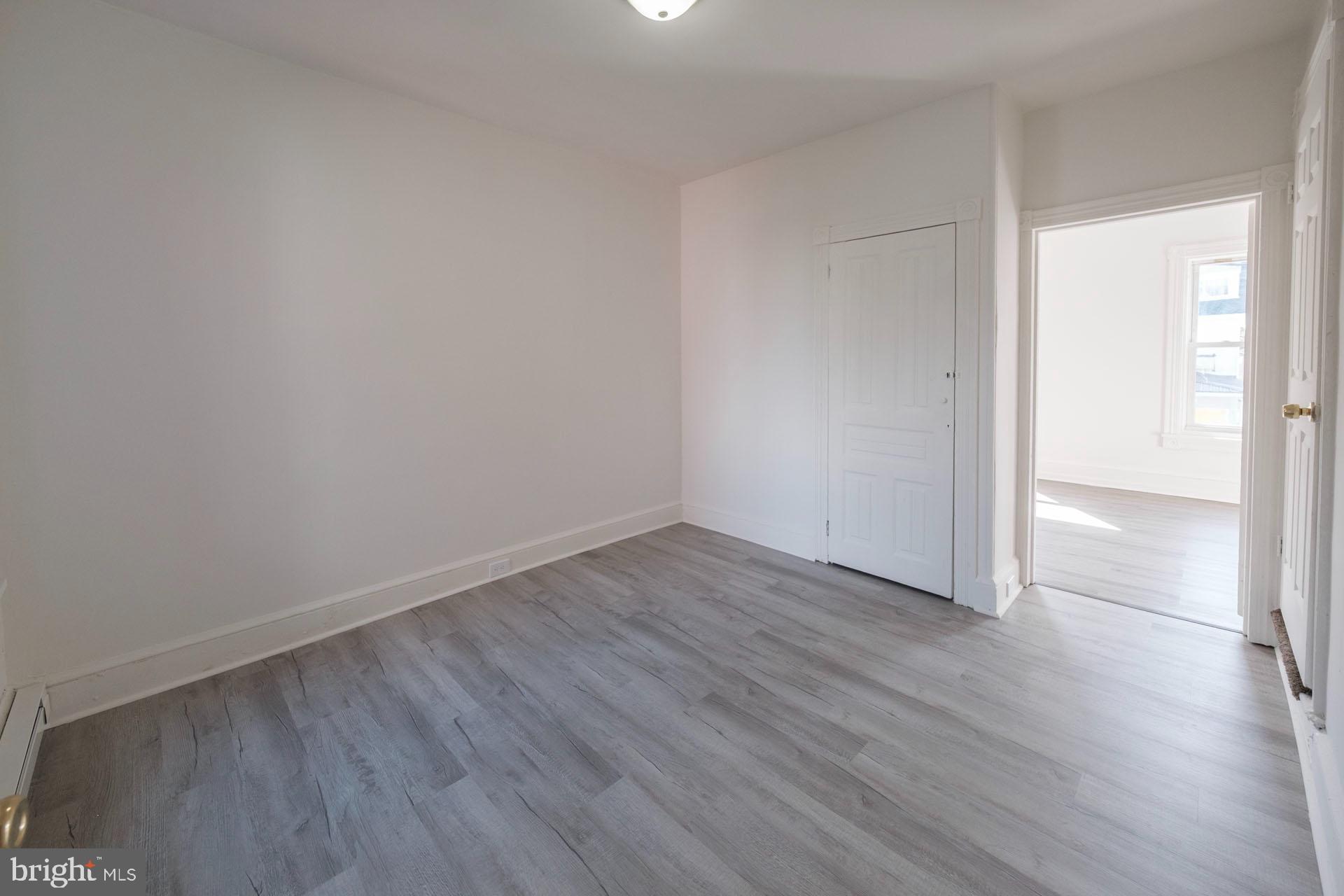 525 South 18th Street Reading, PA 19606 - Photo 12 of 18 a view of an empty room with wooden floor