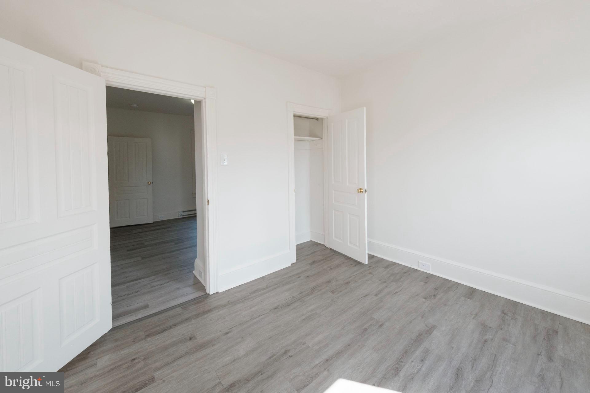 525 South 18th Street Reading, PA 19606 - Photo 14 of 18 a view of an empty room with wooden floor