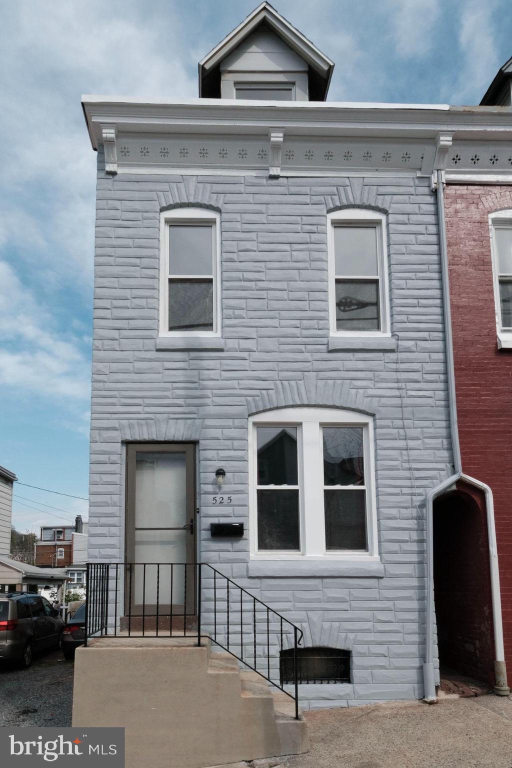 525 South 18th Street Reading, PA 19606 - Photo 3 of 18 a front view of a house with a garage