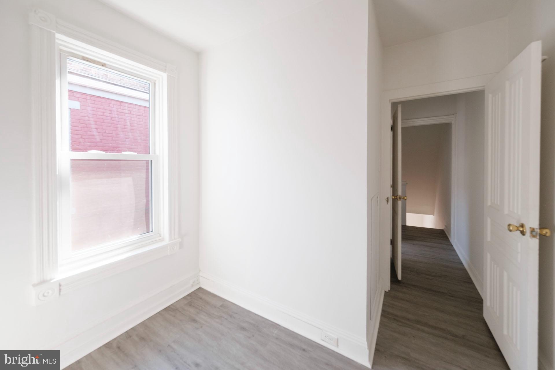 525 South 18th Street Reading, PA 19606 - Photo 10 of 18 a view of a hallway with wooden floor
