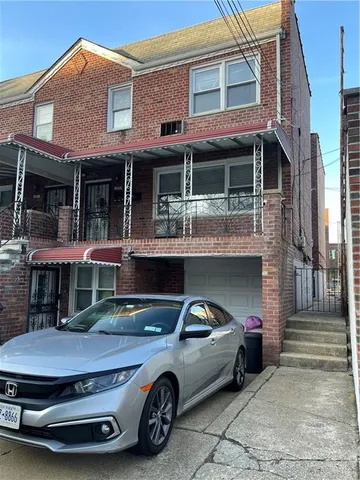 a car parked in front of a building