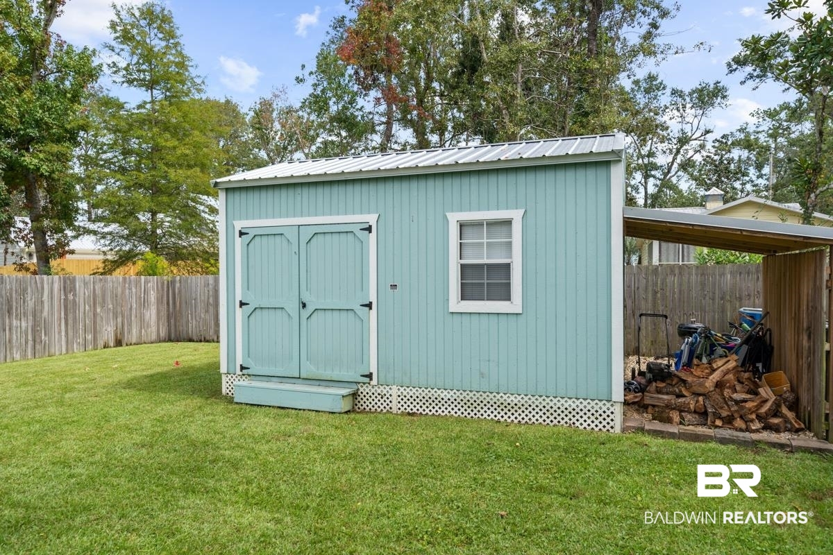 5204 Pine Road Orange Beach, AL 36561 - Photo 21 of 28 Storage shed