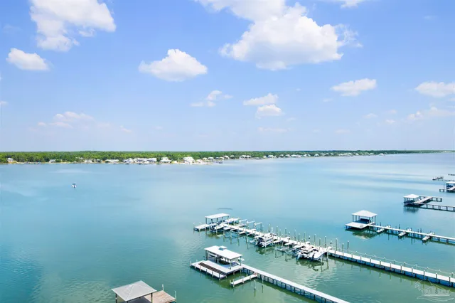 a view of a swimming pool and an ocean view