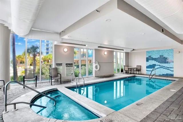 a view of a chairs and table in patio
