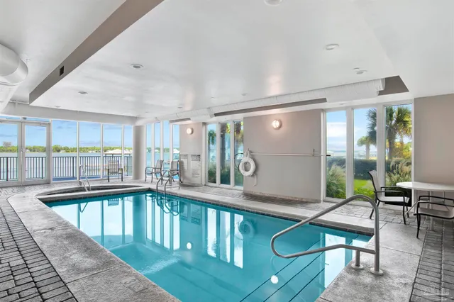 a view of a lake with tall buildings