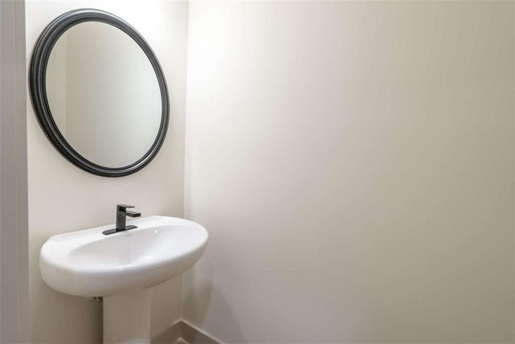 240 Good Hope Preserve Good Hope, GA 30641 - Photo 20 of 50 a bathroom with a sink and a mirror