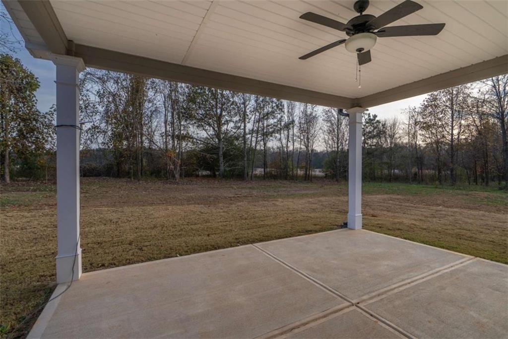 240 Good Hope Preserve Good Hope, GA 30641 - Photo 47 of 50 a view of a patio with a table and chairs