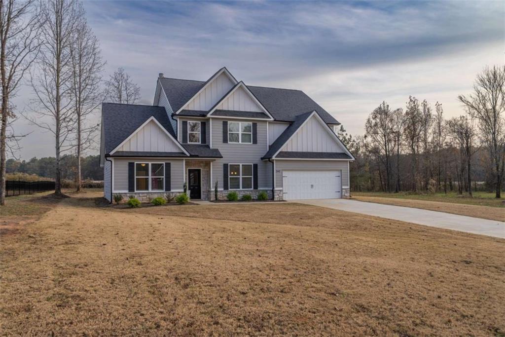 240 Good Hope Preserve Good Hope, GA 30641 - Photo 5 of 50 a front view of a house with a yard