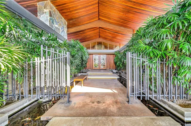 a view of swimming pool with patio