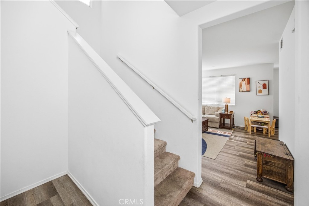 925 Bluebell Way Beaumont, CA 92223 - Photo 13 of 33 a living room with furniture and a stairs