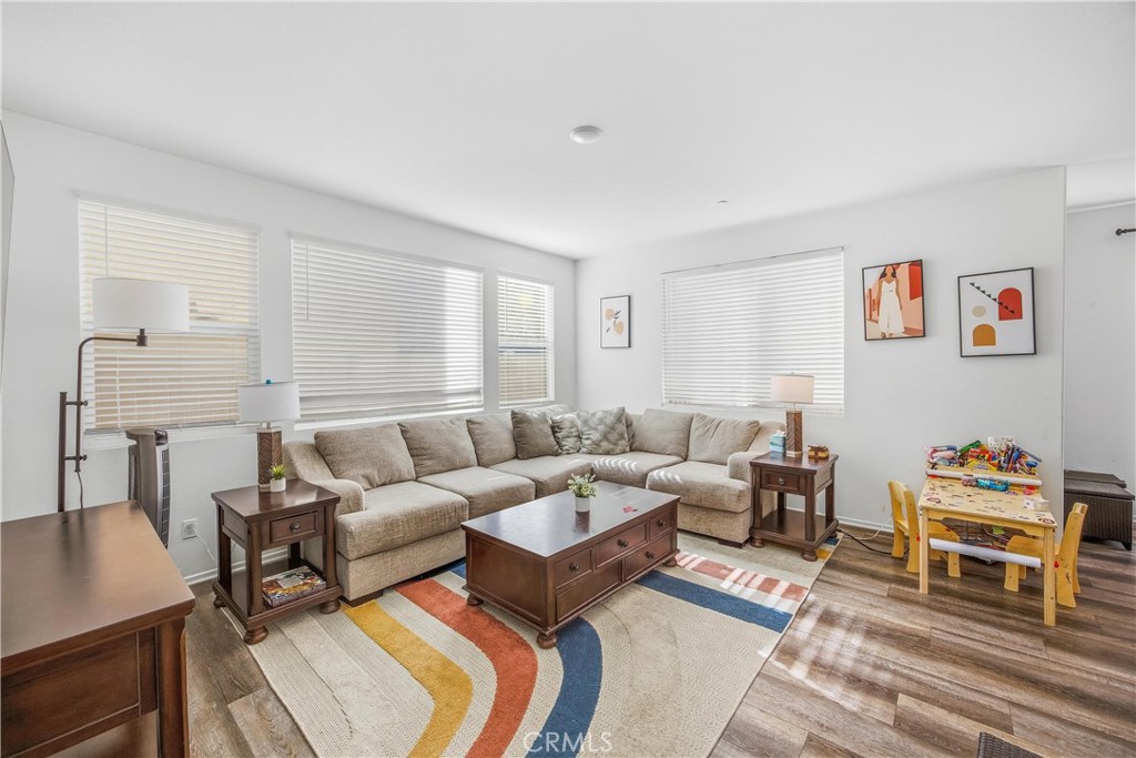 925 Bluebell Way Beaumont, CA 92223 - Photo 7 of 33 a living room with furniture and a couch