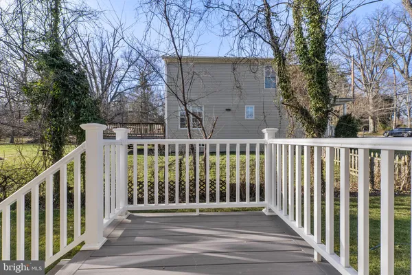 a view of a wooden fence