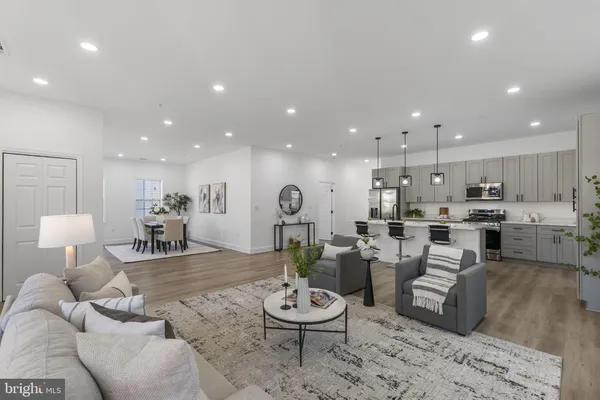 a living room with furniture and a table