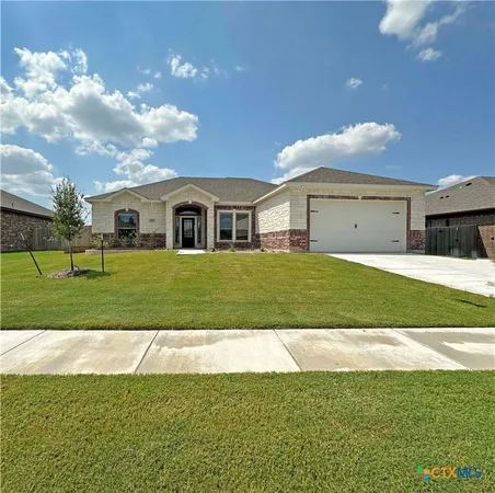 a view of a house with a big yard