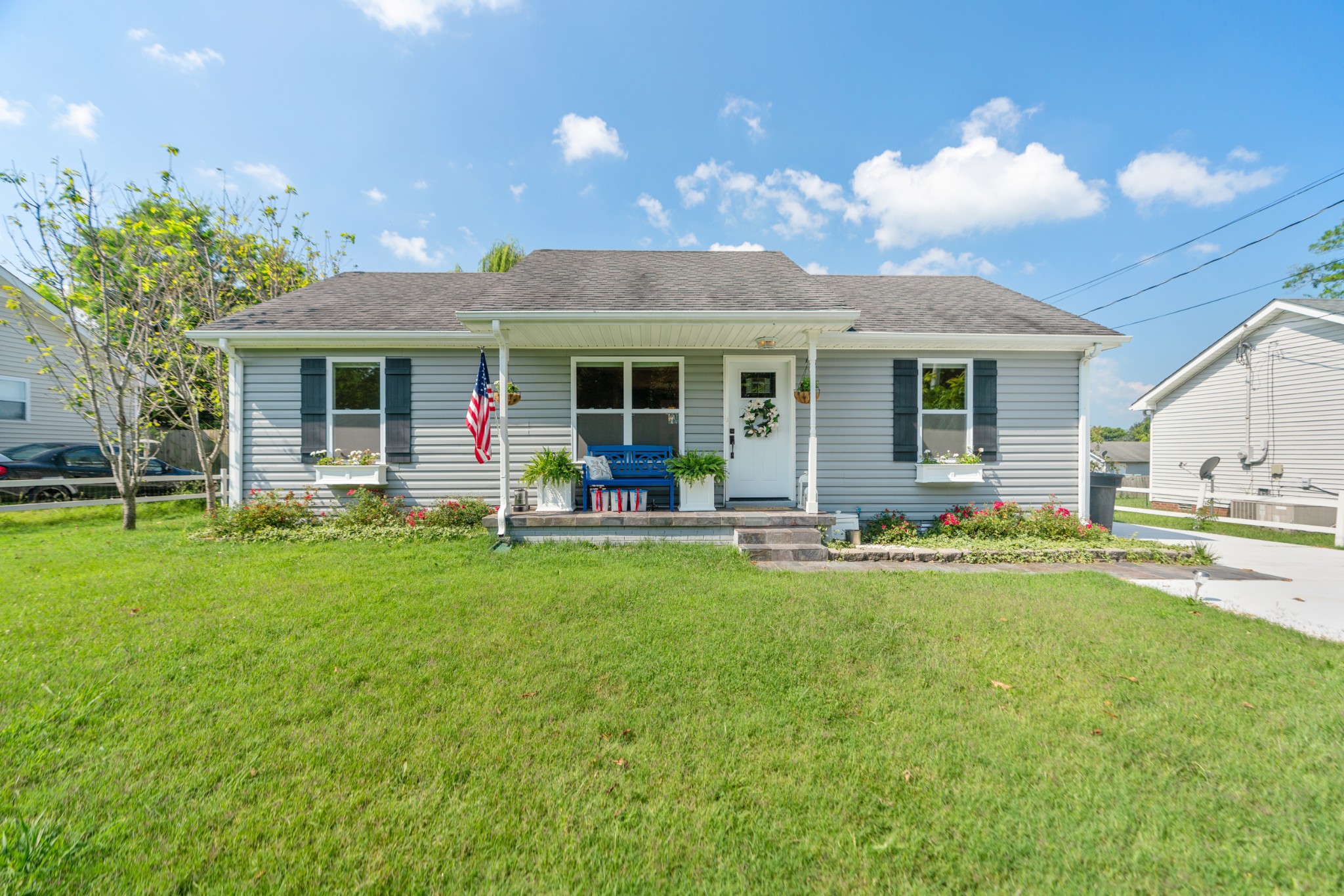 1327 Hugh Hunter Road Oak Grove, KY 42262 - Photo 1 of 36 a view of a house with a backyard and a patio