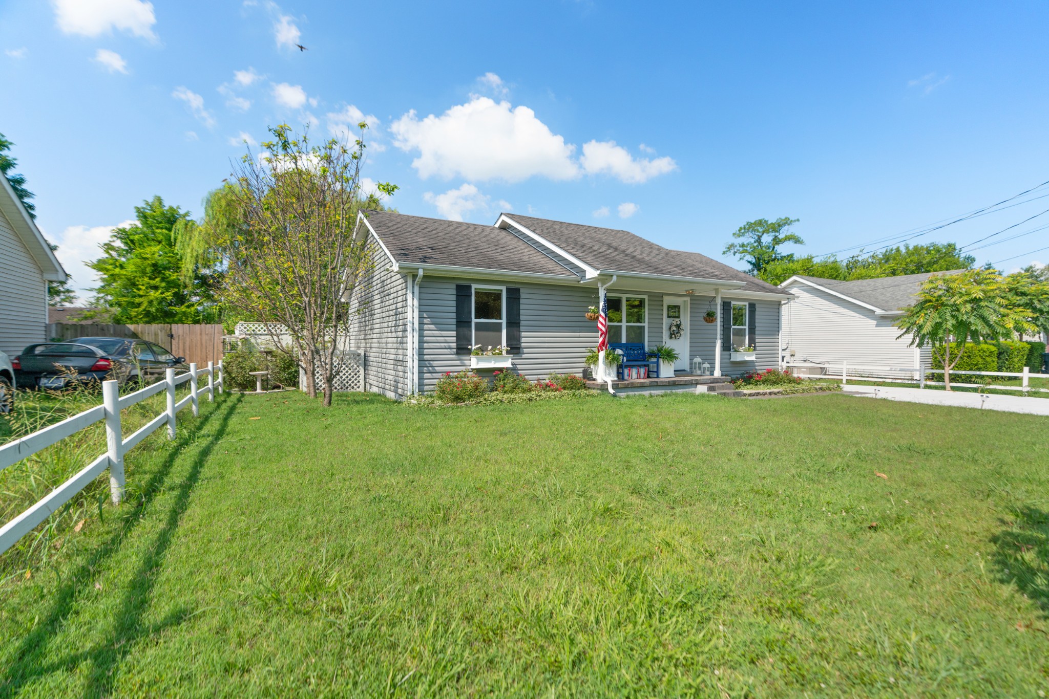 1327 Hugh Hunter Road Oak Grove, KY 42262 - Photo 2 of 36 a view of a house with a backyard porch and sitting area