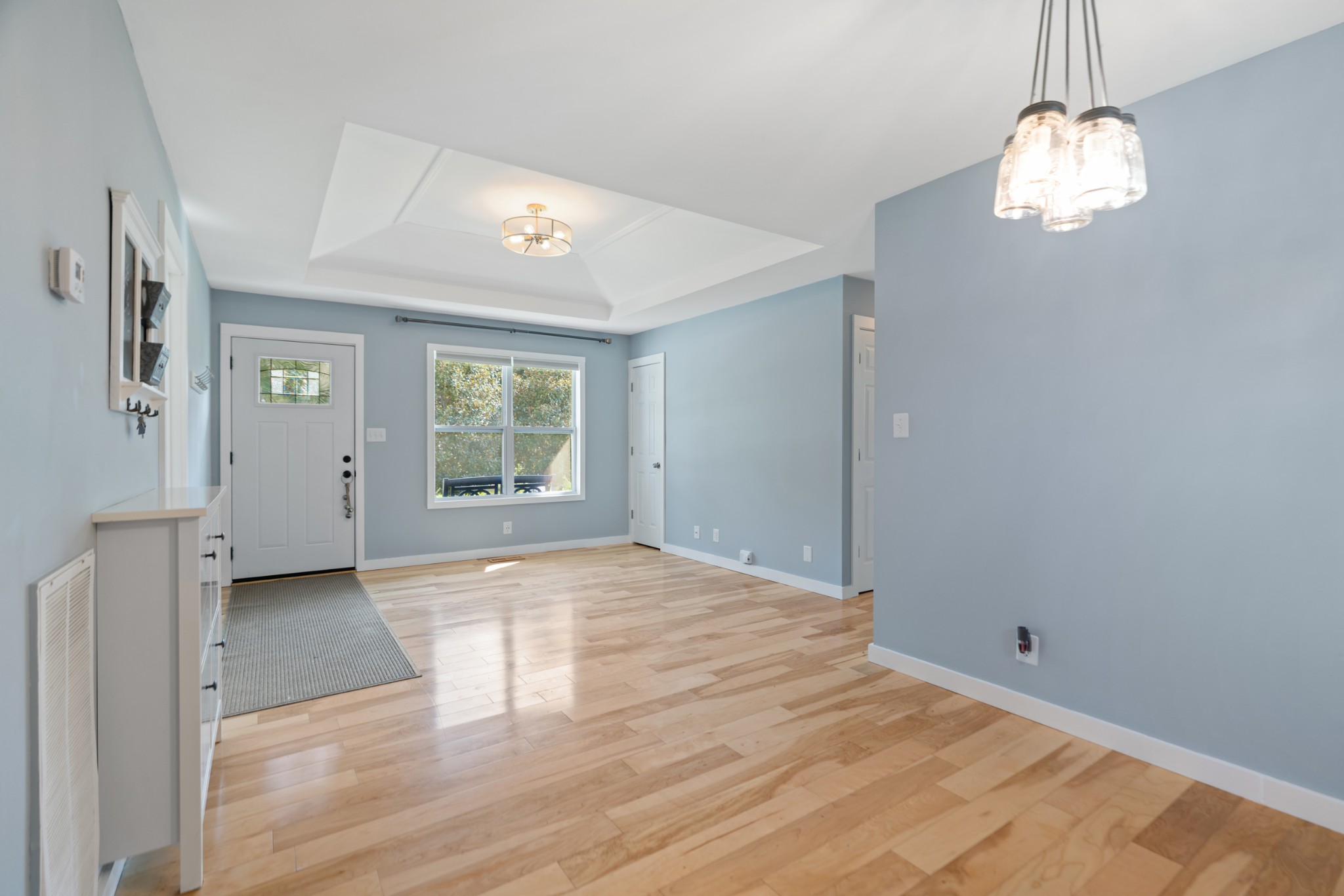 1327 Hugh Hunter Road Oak Grove, KY 42262 - Photo 22 of 36 a view of an empty room with window and wooden floor