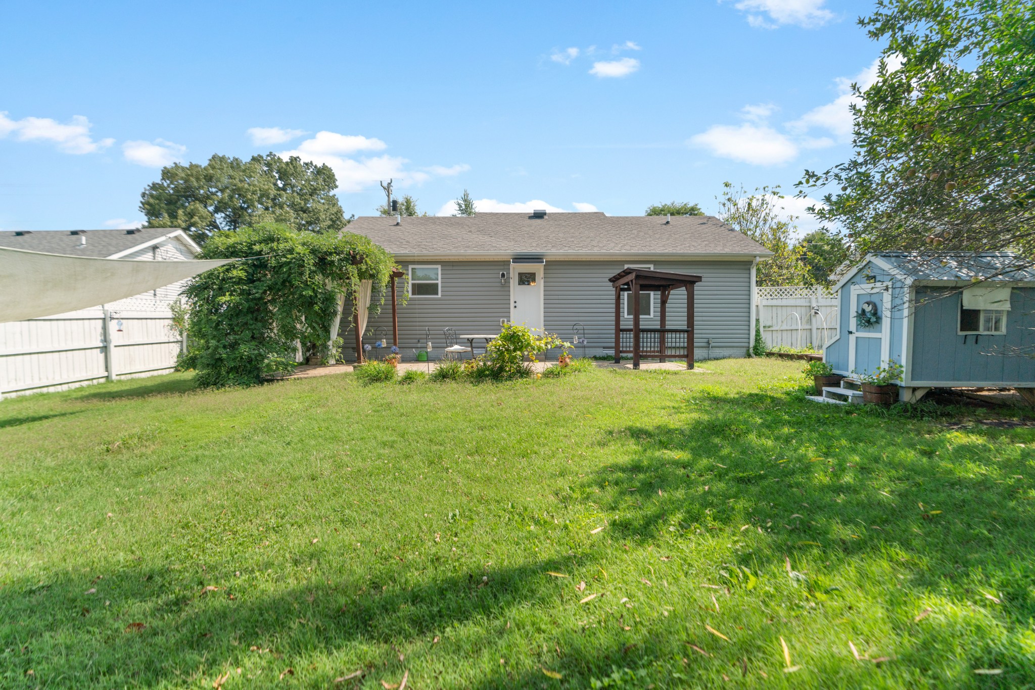 1327 Hugh Hunter Road Oak Grove, KY 42262 - Photo 35 of 36 a front view of house with yard and trees in the background