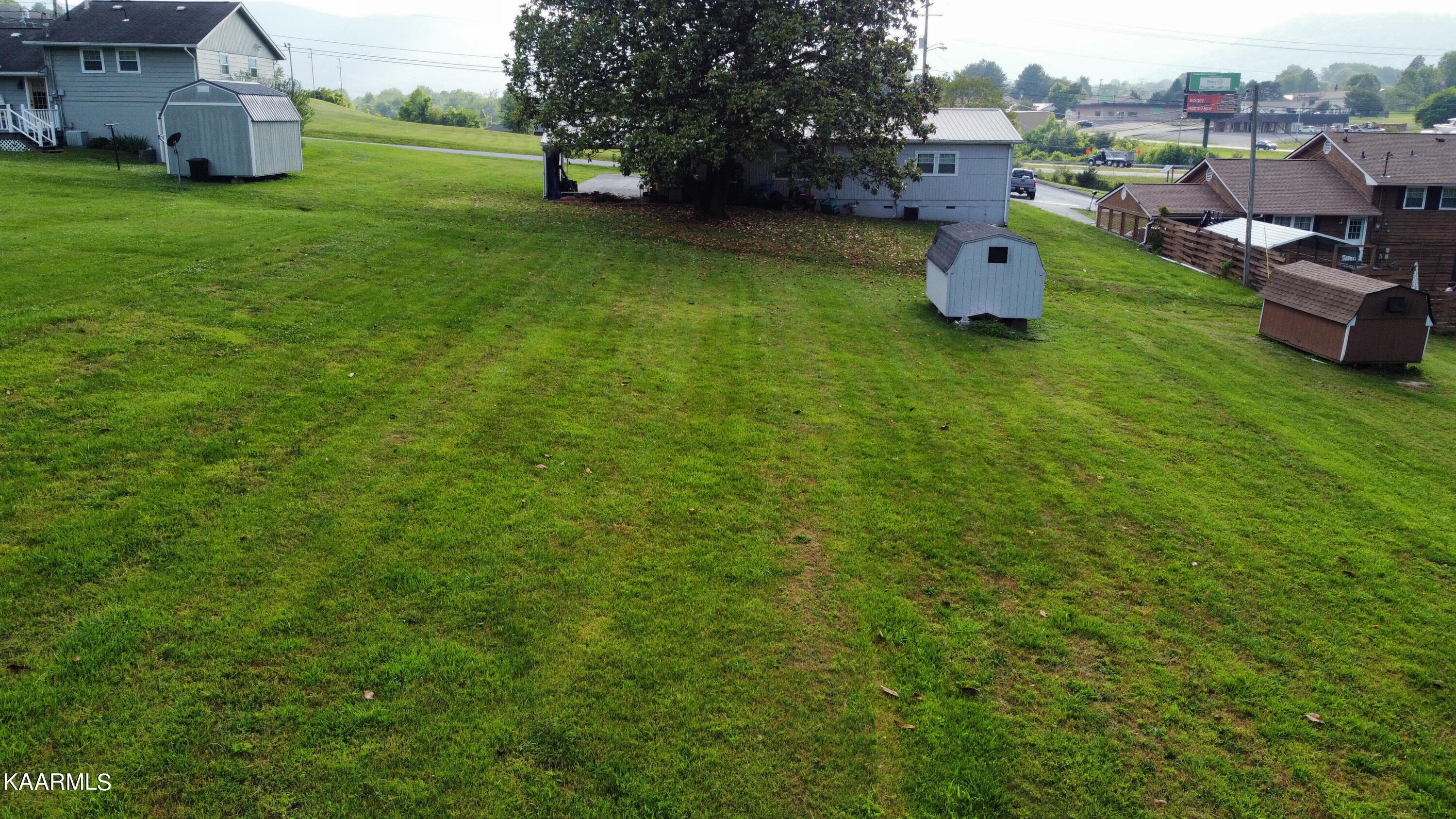 135 Sharp And Perkins Road Jacksboro, TN 37757 - Photo 6 of 18 backyard 2-2