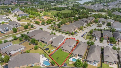 an aerial view of a city with lots of residential buildings