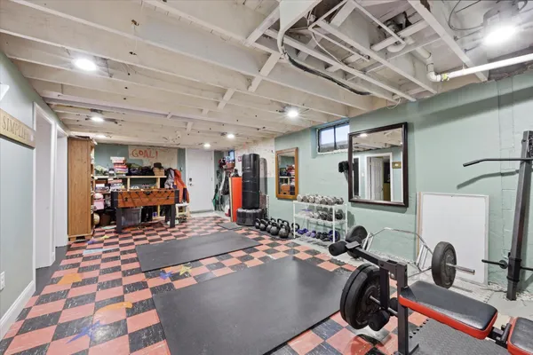 a room with lots of gym equipment