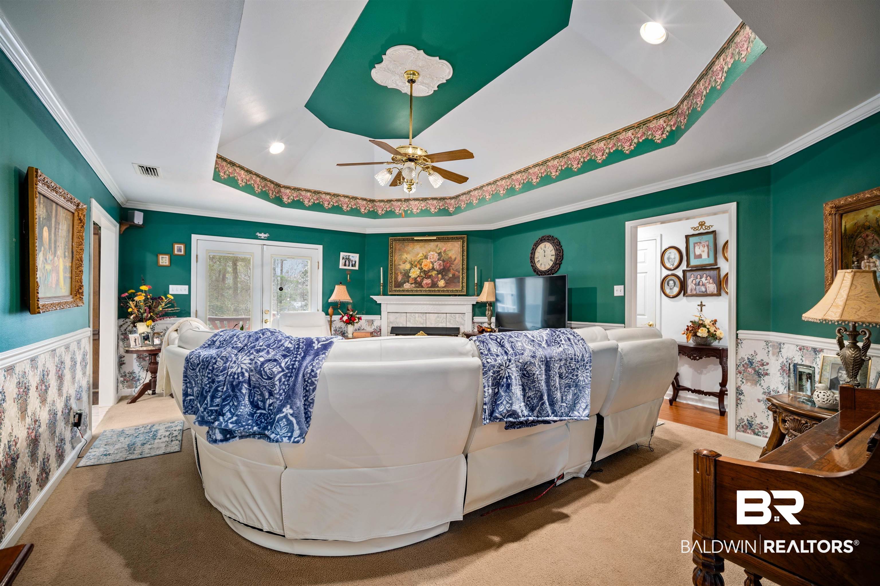 1744 Aden Road Mobile, AL 36695 - Photo 6 of 35 Carpeted bedroom featuring a raised ceiling, ceiling fan, and crown molding
