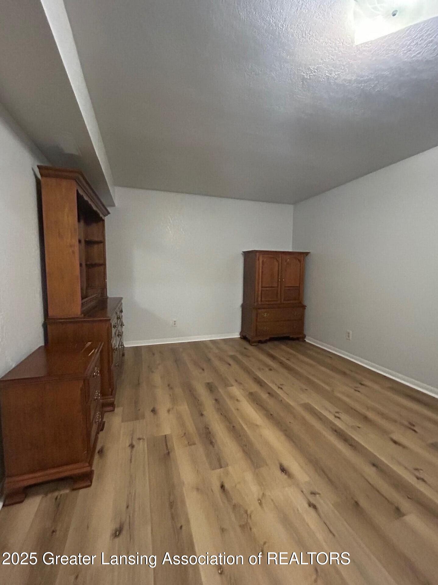 1717 Maple Ridge Road, Unit 49 Haslett, MI 48840 - Photo 10 of 23 Primary bed 3