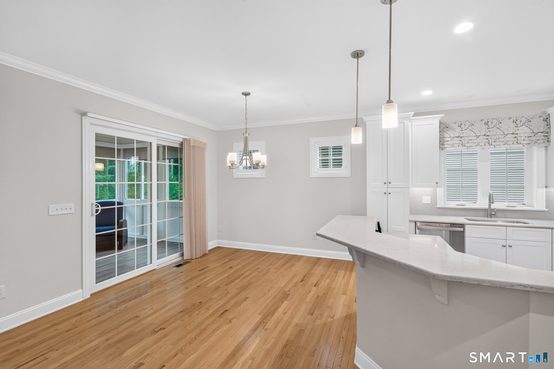 6 Prospect Ridge, Unit 6 Simsbury, CT 06070 - Photo 10 of 33 View to the 3-season room