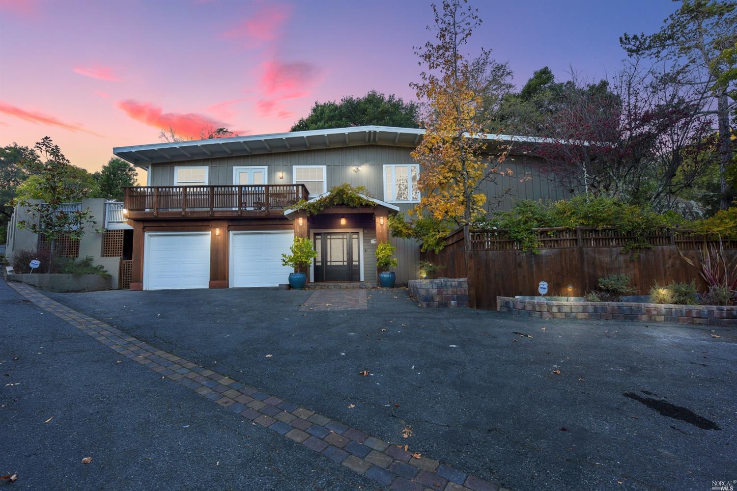 45 Oak Knoll Drive San Anselmo, CA 94960 - Photo 1 of 1 a front view of a house with a yard and sitting area