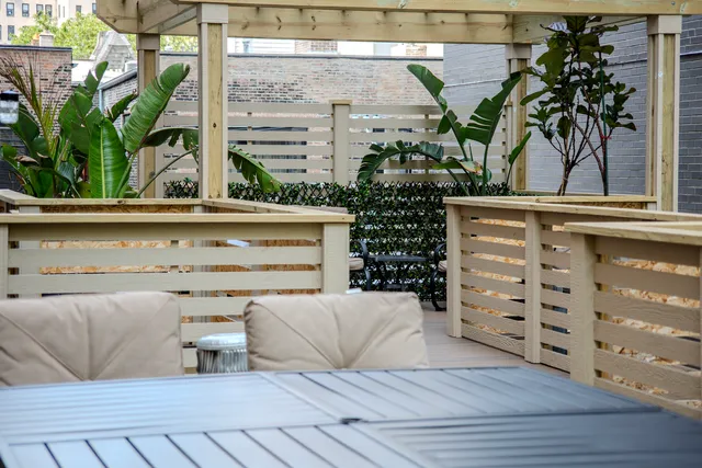 a kitchen with a refrigerator and a sink