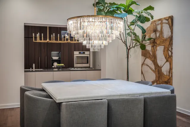 a bedroom with a bed and a mirror