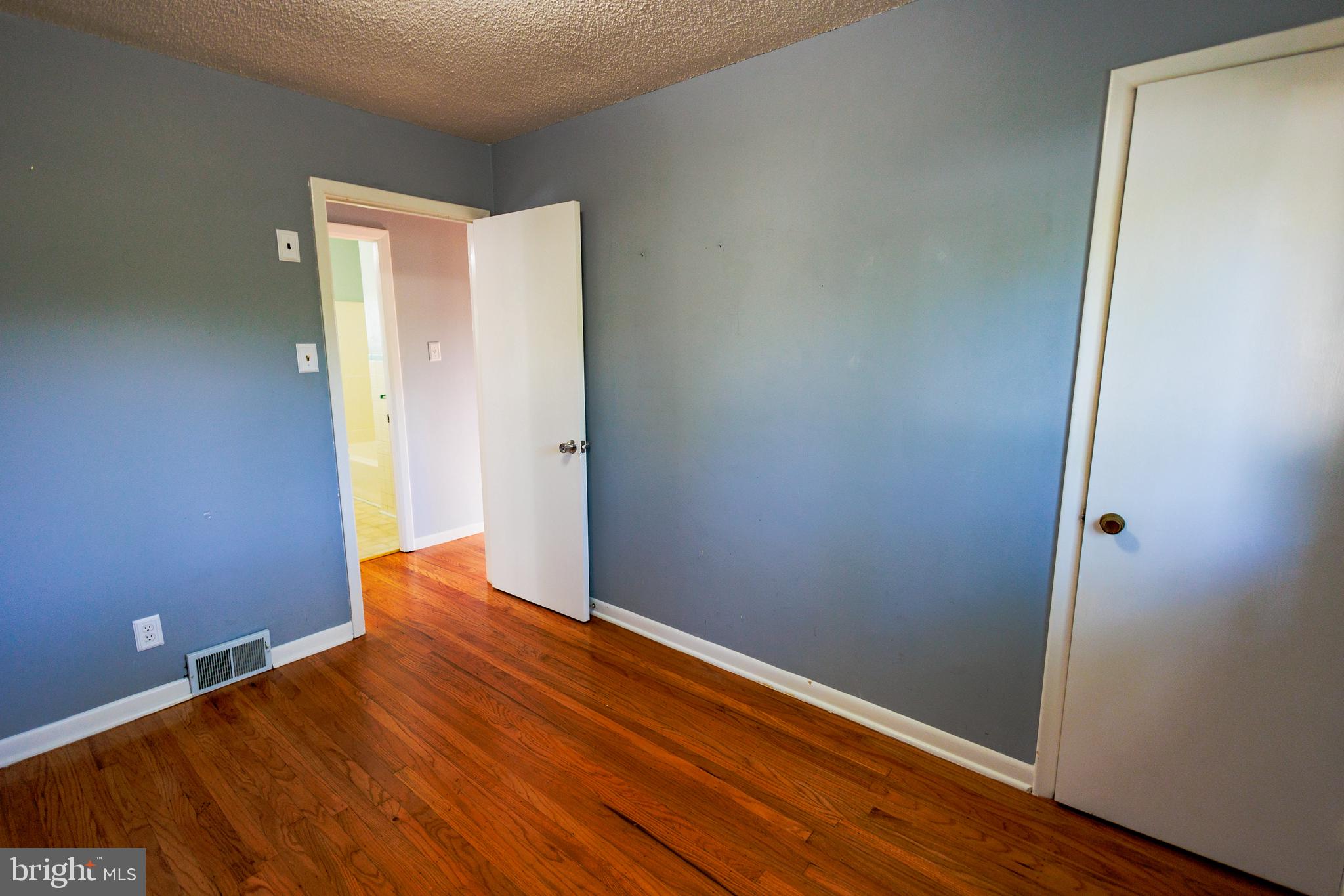 200 Baldwin Road Glassboro, NJ 08028 - Photo 16 of 29 a view of empty room with wooden floor