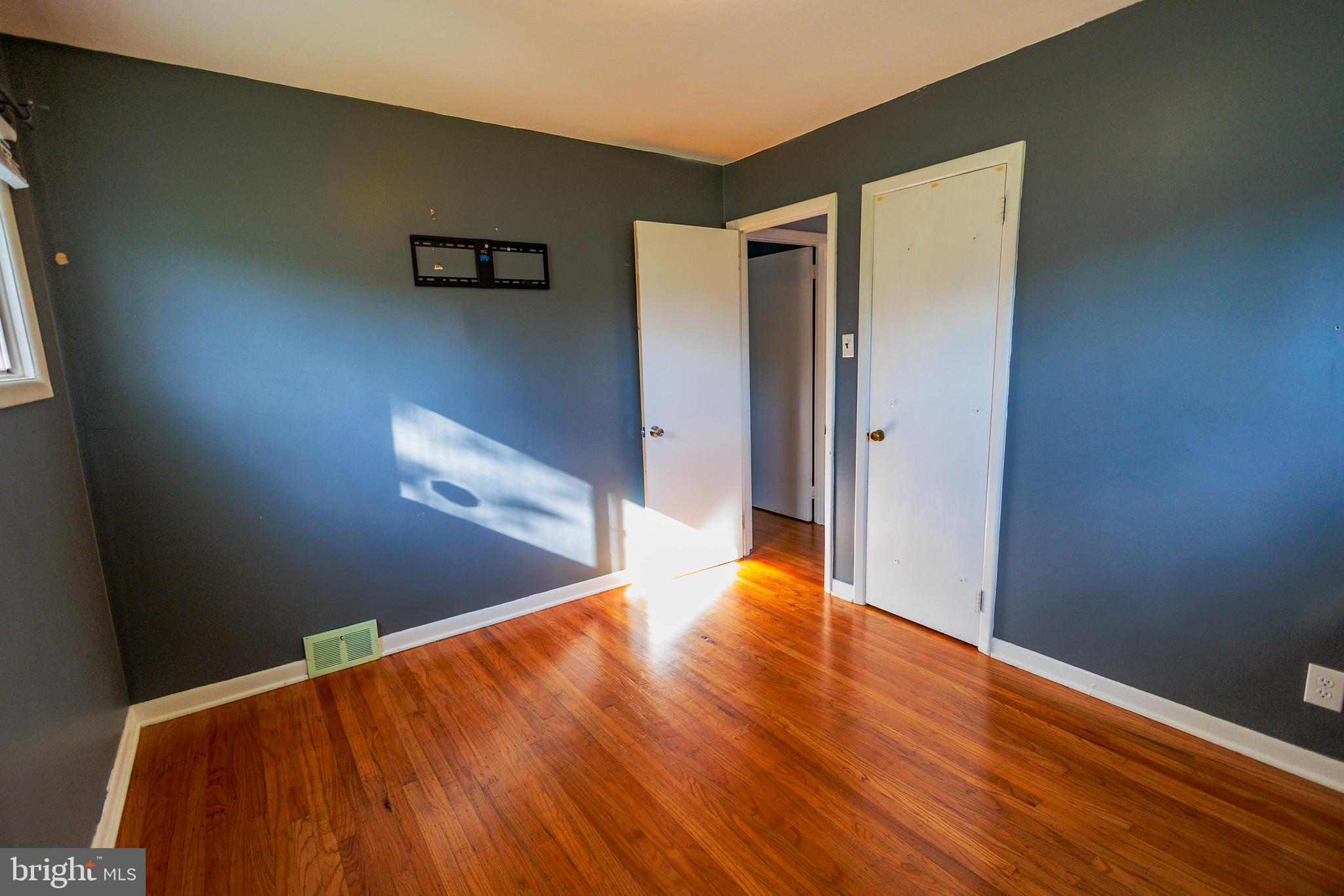200 Baldwin Road Glassboro, NJ 08028 - Photo 18 of 29 a view of a hallway with wooden floor