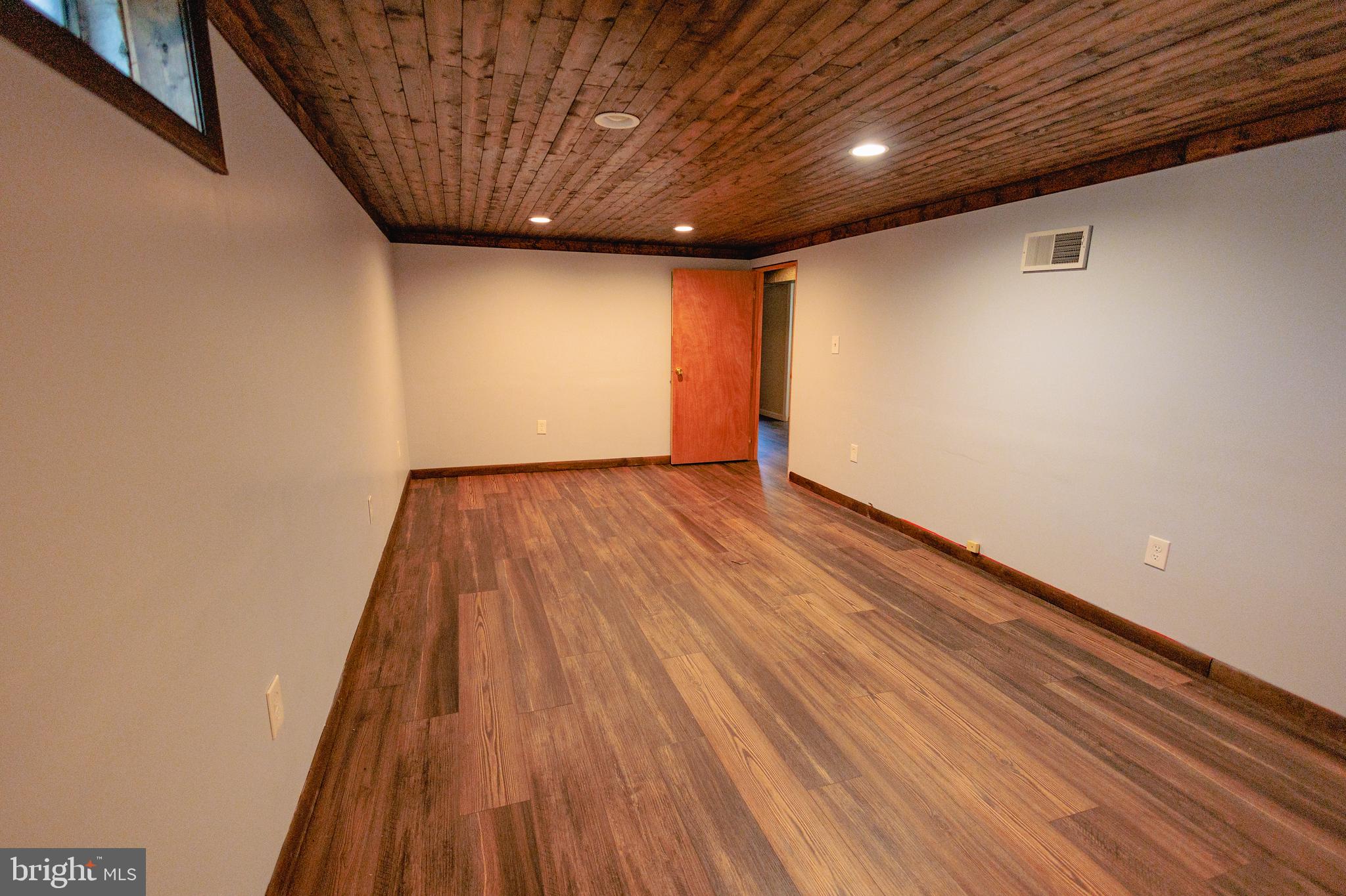 200 Baldwin Road Glassboro, NJ 08028 - Photo 23 of 29 a view of empty room with wooden floor