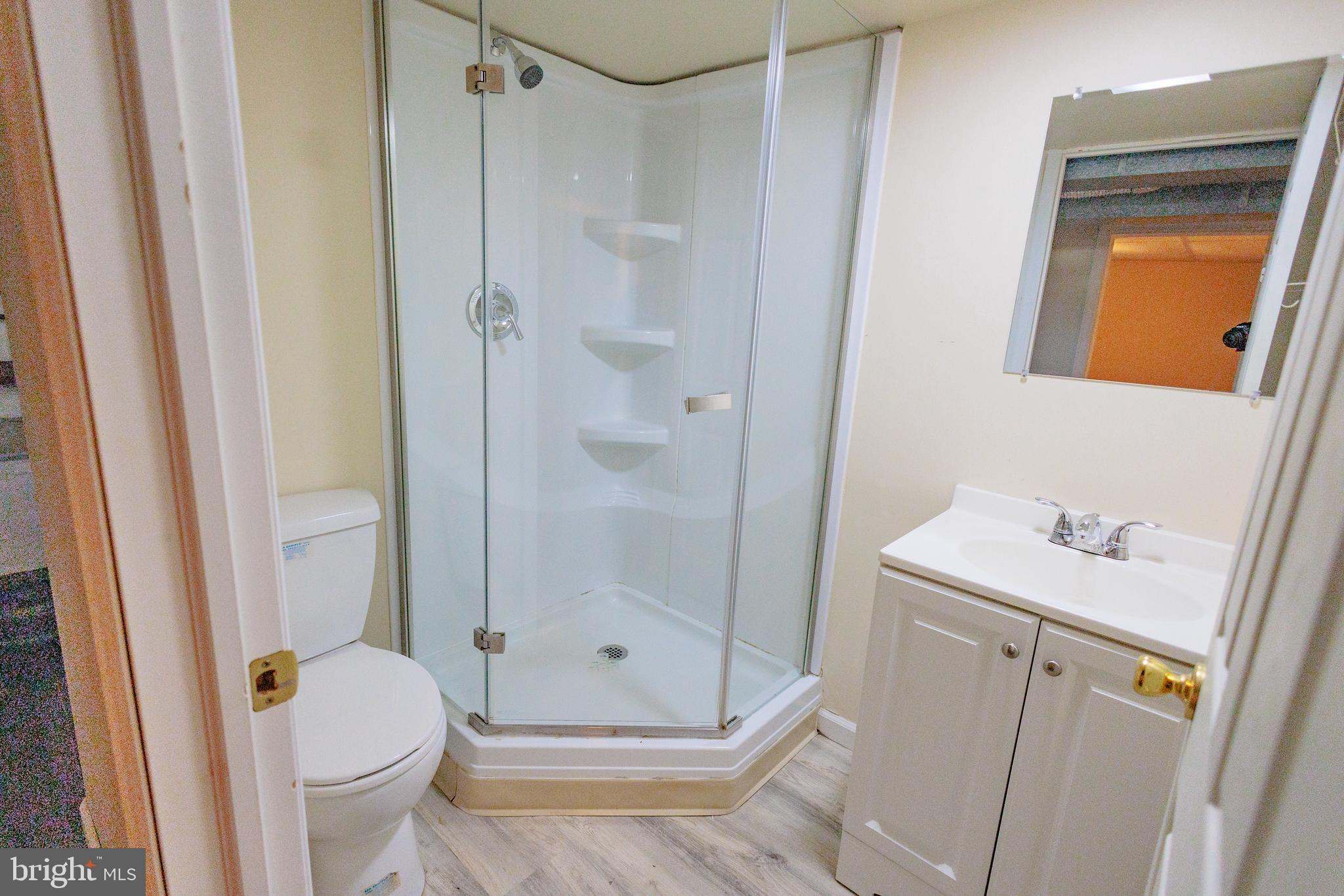 200 Baldwin Road Glassboro, NJ 08028 - Photo 28 of 29 a bathroom with a sink toilet and shower