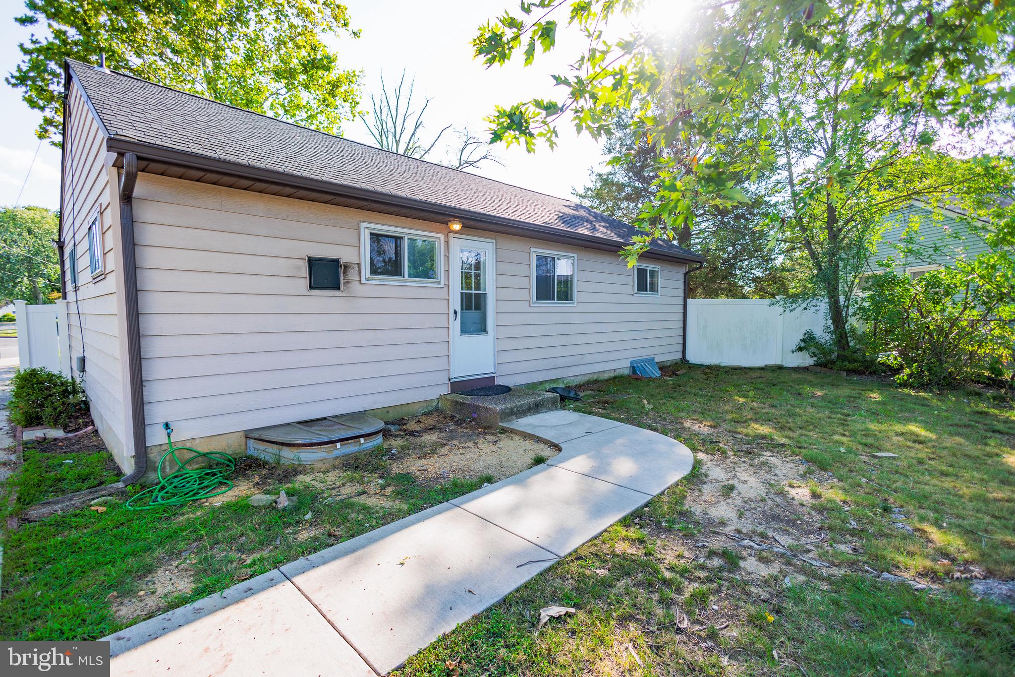 200 Baldwin Road Glassboro, NJ 08028 - Photo 4 of 29 a front view of a house with garden
