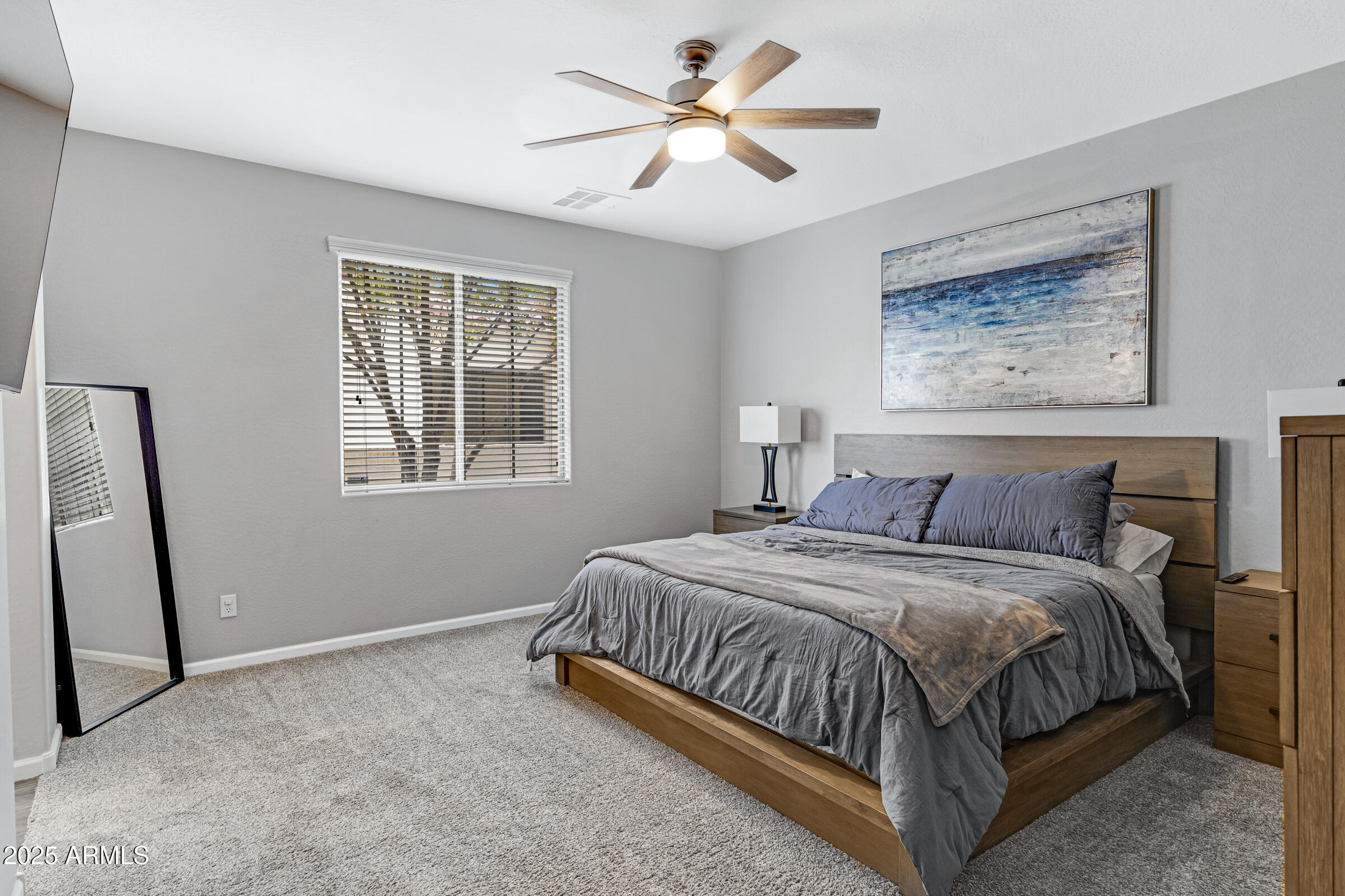 15366 West Bloomfield Road Surprise, AZ 85379 - Photo 13 of 48 a bedroom with a bed and a window
