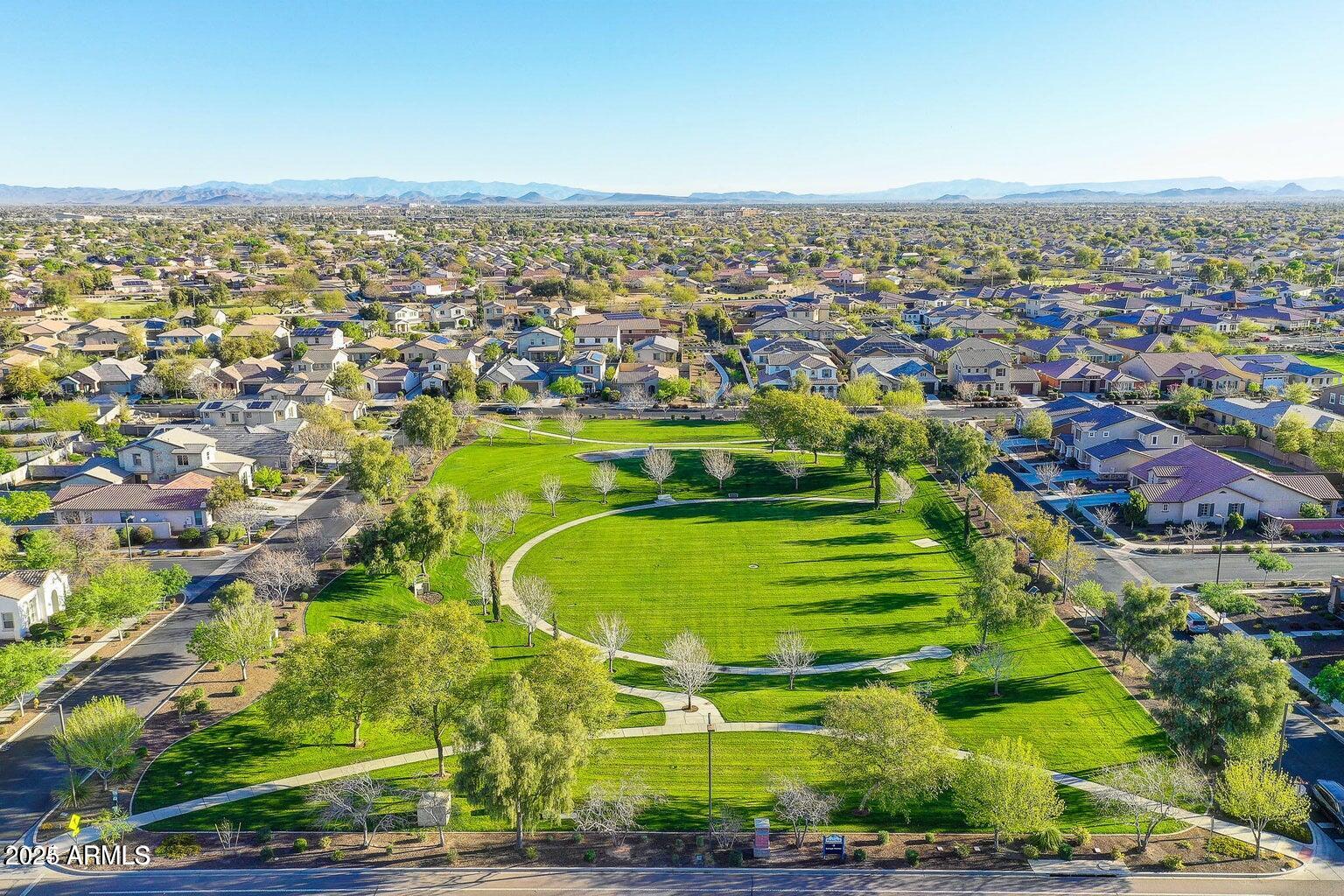 15366 West Bloomfield Road Surprise, AZ 85379 - Photo 17 of 48 an aerial view of residential houses with outdoor space and swimming pool