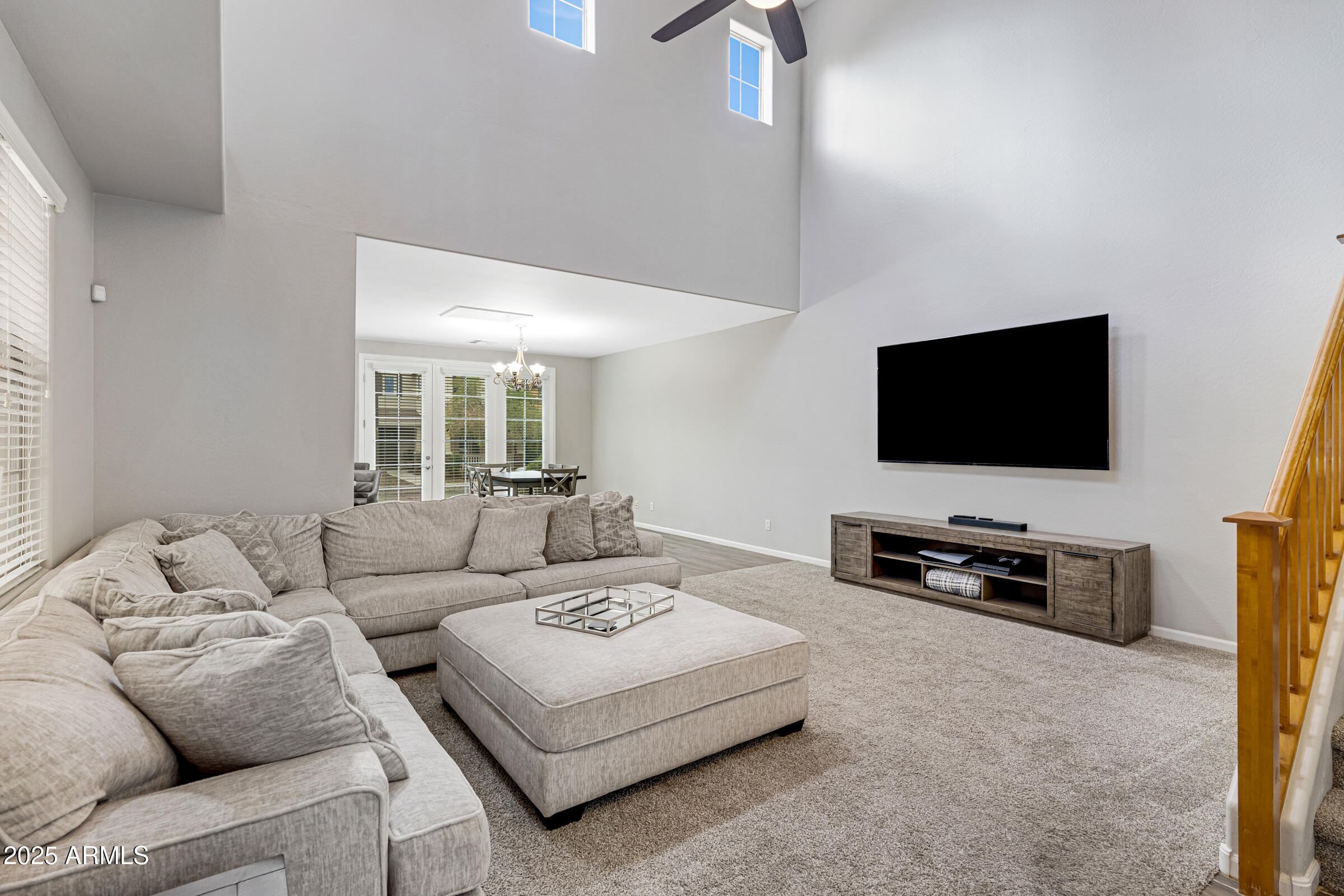 15366 West Bloomfield Road Surprise, AZ 85379 - Photo 22 of 48 a living room with furniture and a flat screen tv