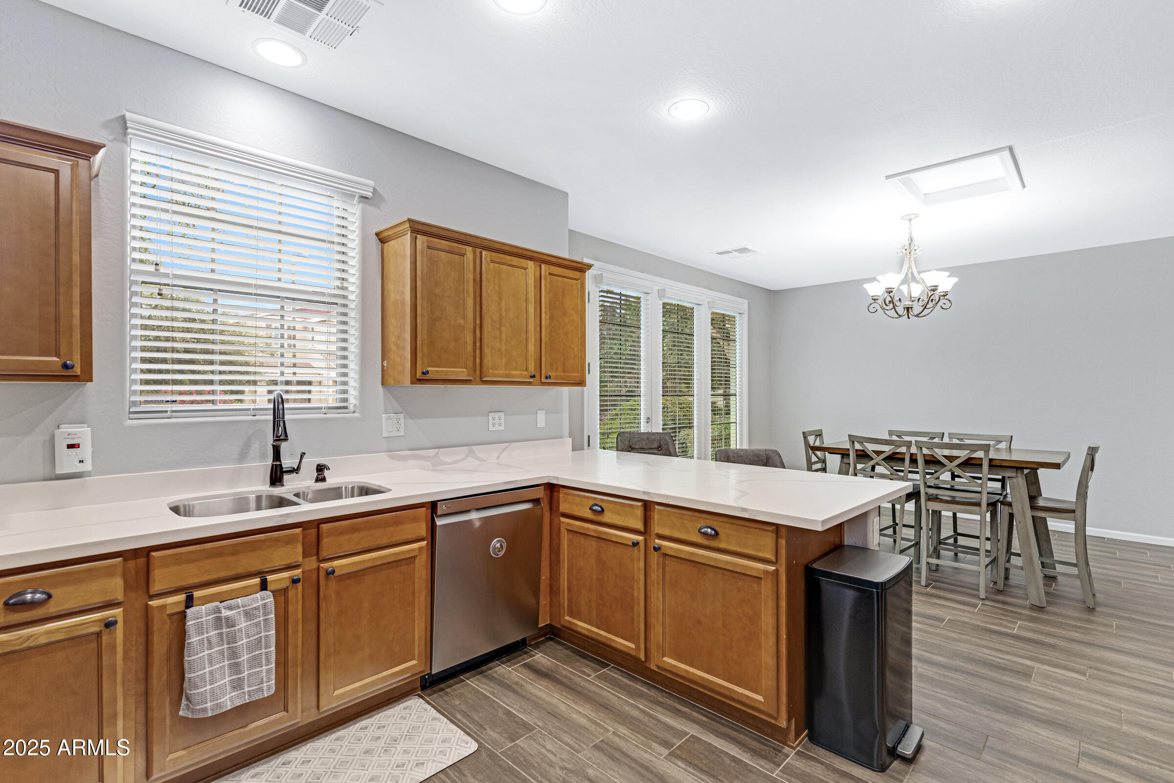 15366 West Bloomfield Road Surprise, AZ 85379 - Photo 25 of 48 a kitchen with a sink window and cabinets