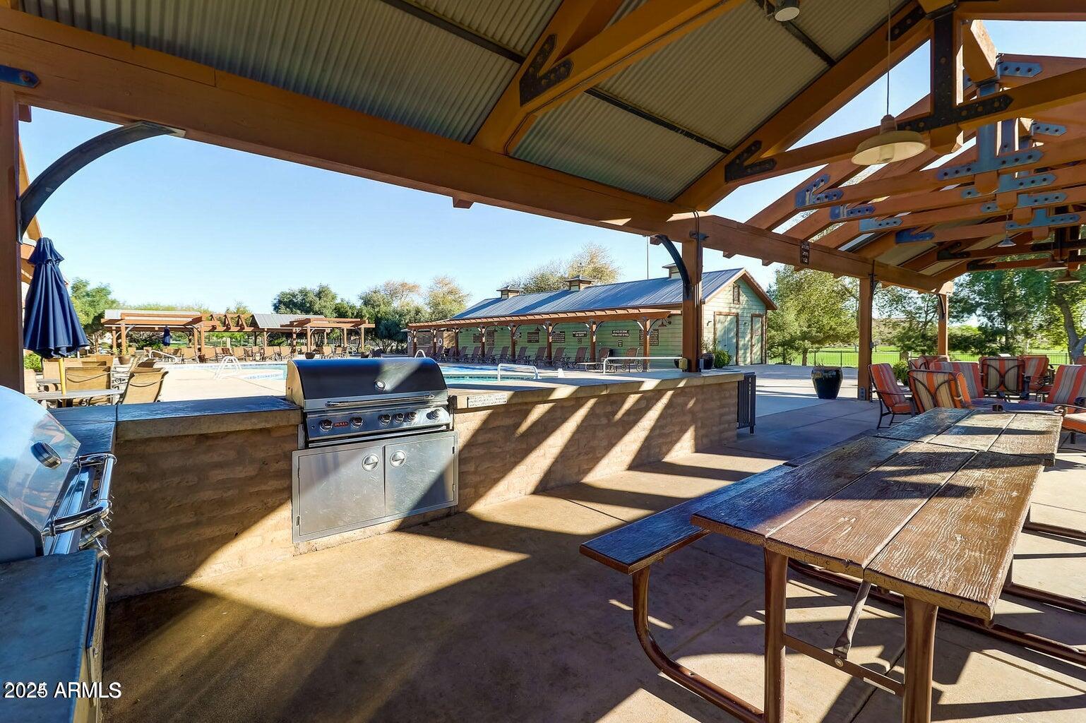 15366 West Bloomfield Road Surprise, AZ 85379 - Photo 44 of 48 a view of a patio with swimming pool