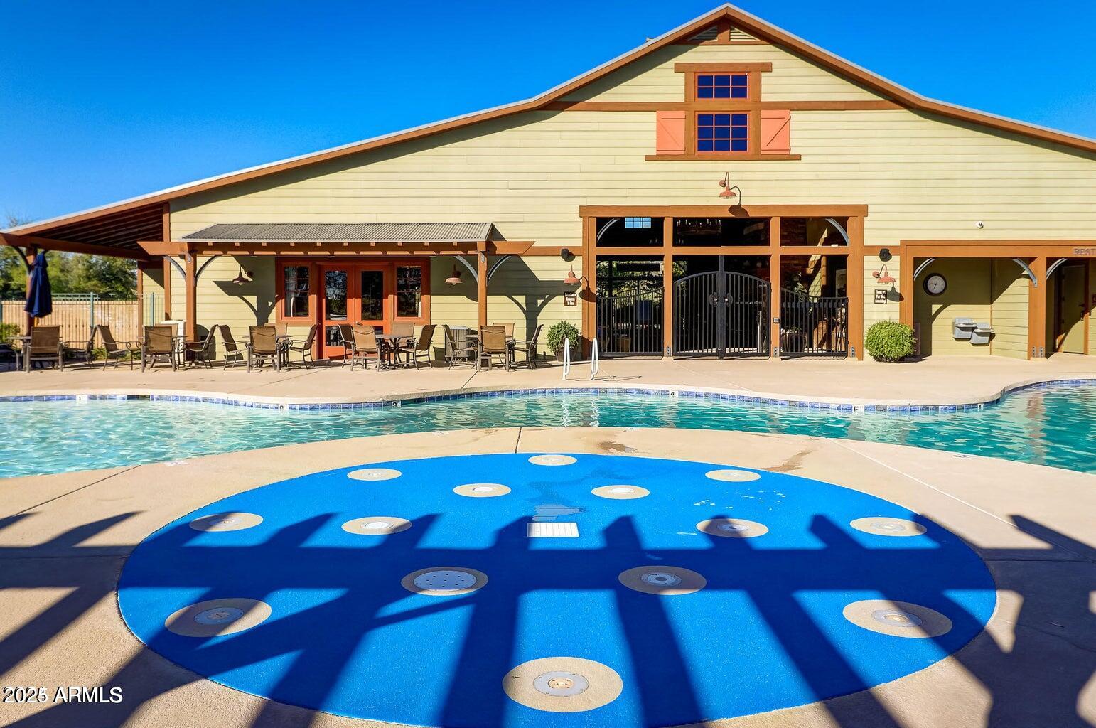 15366 West Bloomfield Road Surprise, AZ 85379 - Photo 47 of 48 a front view of house and yard with swimming pool and outdoor seating