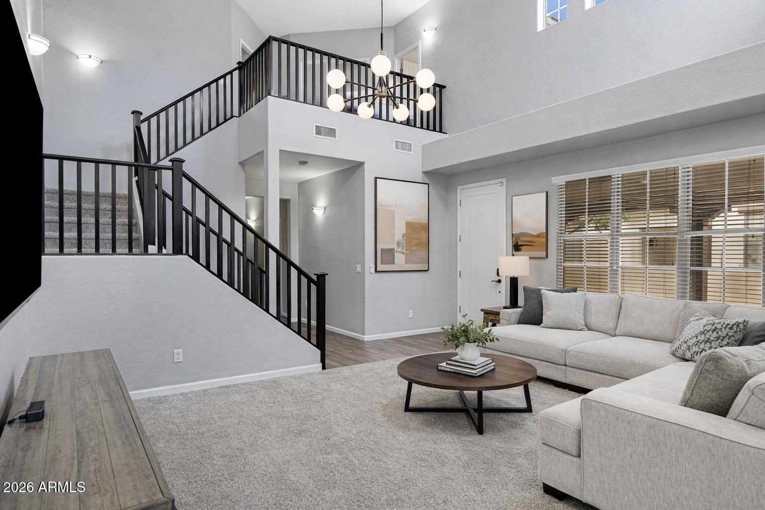 15366 West Bloomfield Road Surprise, AZ 85379 - Photo 6 of 48 a view of livingroom with furniture and windows