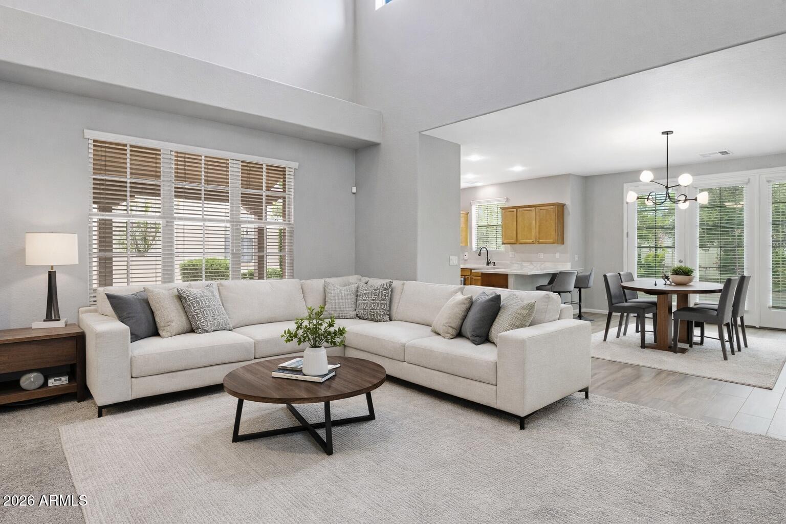 15366 West Bloomfield Road Surprise, AZ 85379 - Photo 7 of 48 a living room with furniture and a large window