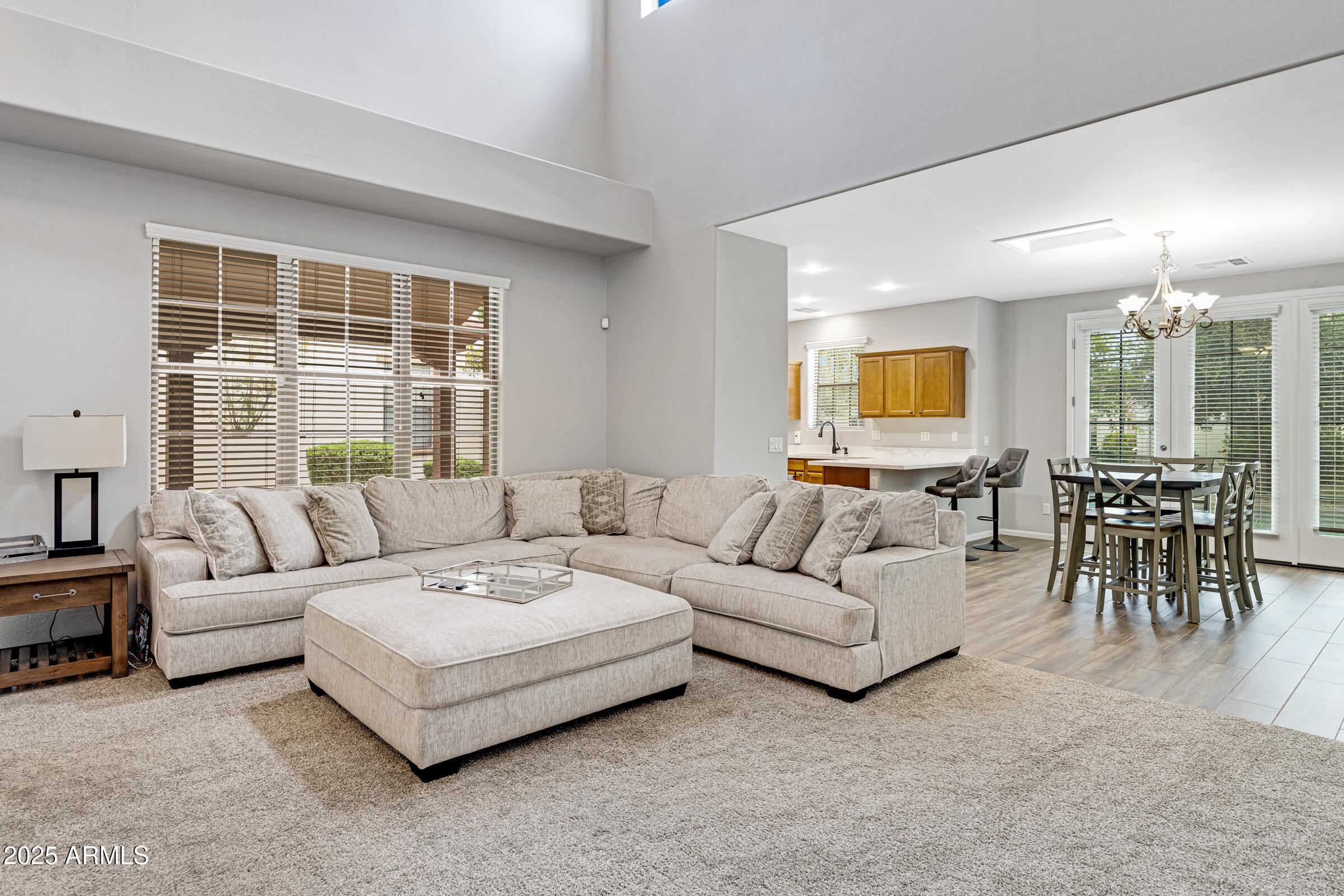 15366 West Bloomfield Road Surprise, AZ 85379 - Photo 8 of 48 a living room with furniture and a large window