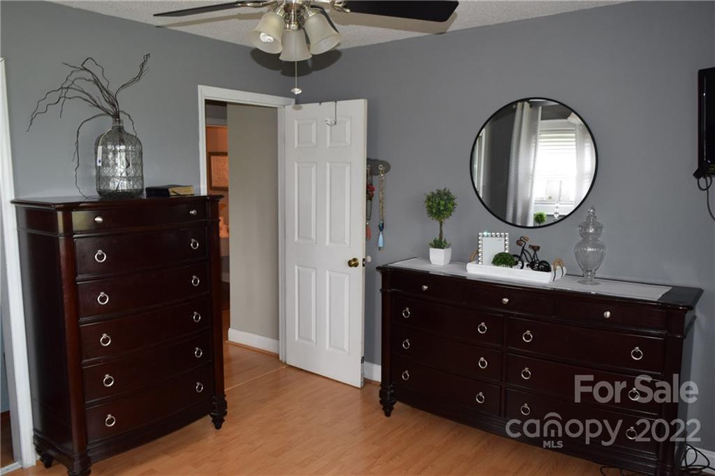 3136 Pea Ridge Road Mill Spring, NC 28756 - Photo 20 of 24 a bathroom with a sink vanity and a mirror