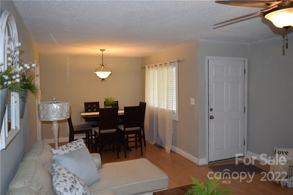 3136 Pea Ridge Road Mill Spring, NC 28756 - Photo 8 of 24 a view of a livingroom with furniture